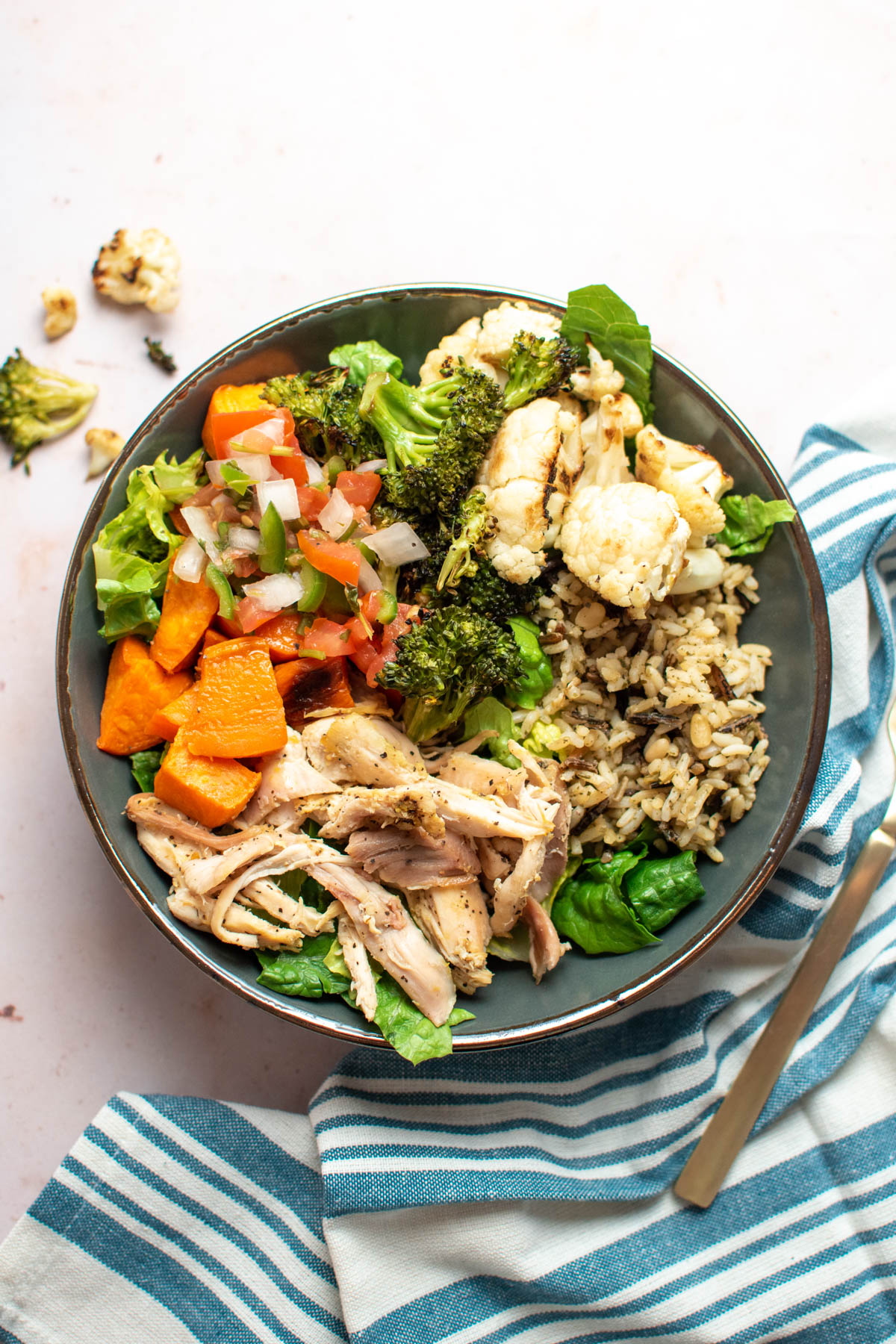 Chicken power bowl with roasted veggies.