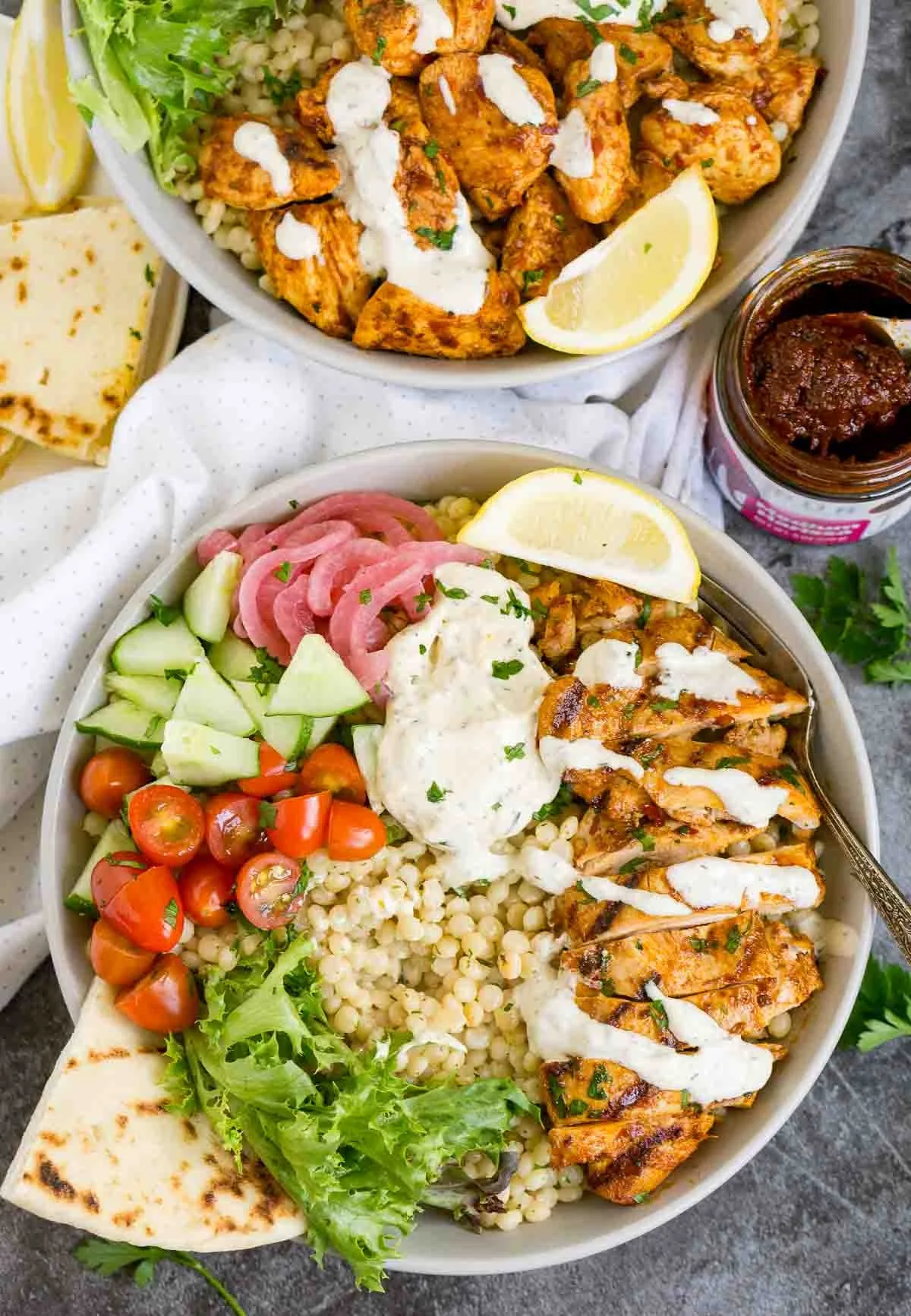 Harissa chicken bowl with rice and veggies.