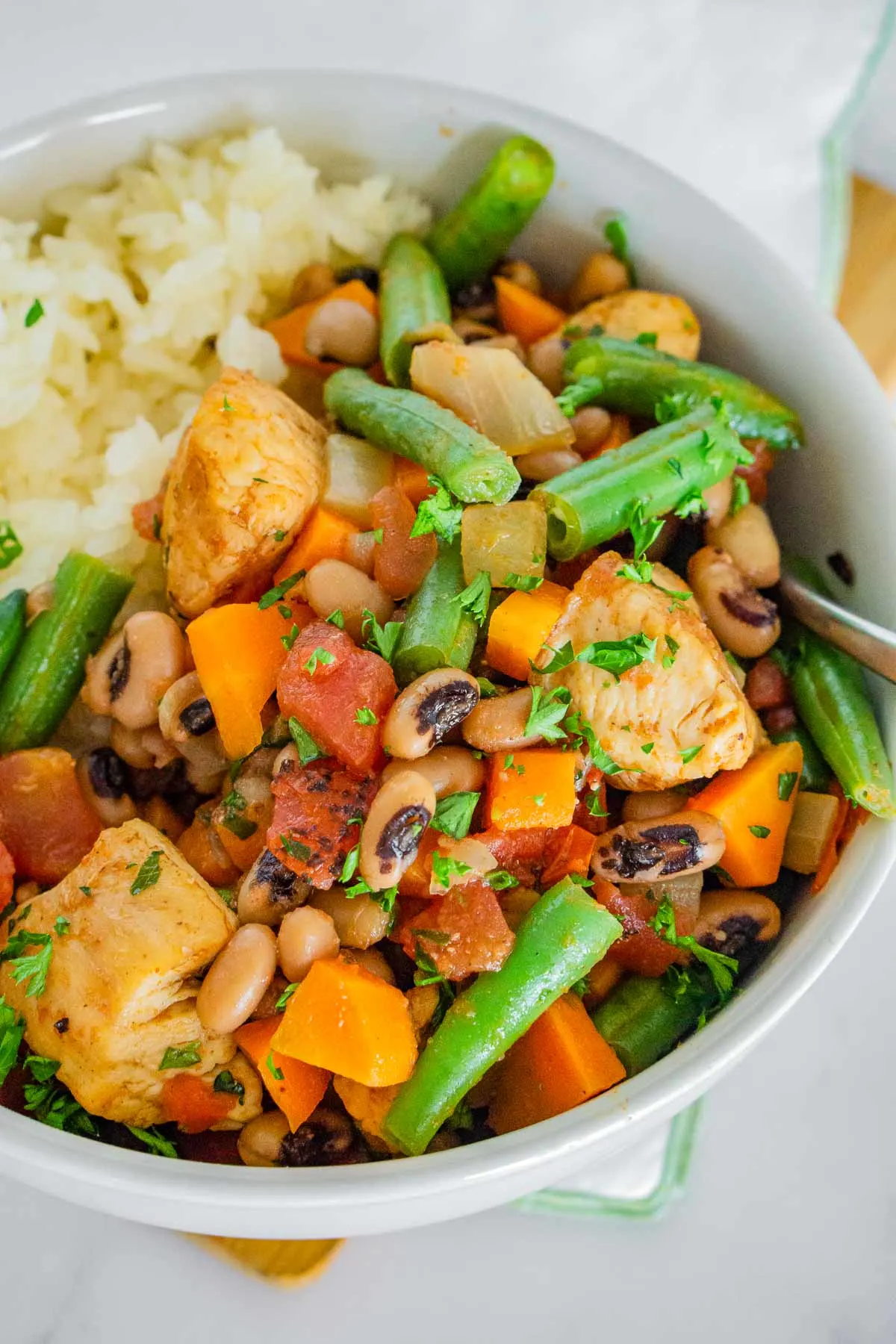 Blackened chicken black eyed pea bowl with green beans and rice.