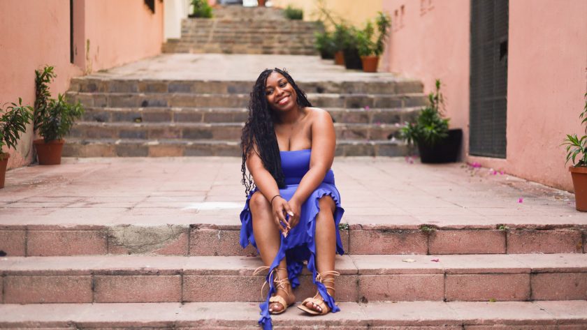 Black woman smiling in Puerto Rico.